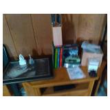 Random household products and supplies along with a boxed set (3 out of 4 pcs) books from The Wonderful World of Walt Disney.