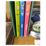 Random household products and supplies along with a boxed set (3 out of 4 pcs) books from The Wonderful World of Walt Disney.