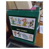 Random household products and supplies along with a boxed set (3 out of 4 pcs) books from The Wonderful World of Walt Disney.