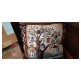 Household Furniture group to include a uniquely crafted 4 tier wood corner shelf/plant stand with a Wood framed and cushioned glider Rocker and decorative display pillow embroidered to show a birdhous