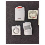 Lot includes an Articulating Lamp, Driveway Alarms & Timers