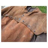 The Shop Lot includes Leather Welding Coat, Rain Coat, Overalls, Tire Iron & Jack