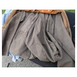 The Shop Lot includes Leather Welding Coat, Rain Coat, Overalls, Tire Iron & Jack
