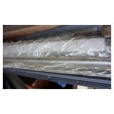 A Bucket Filled With Miscellaneous Items--Warps Carry Home Plastic Sheeting