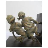 Kids Playing Tug-O-War Bookends Set