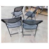 (4) Plastic Folding Chairs.