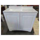 36 in. W x 19 in. D Bathroom Vanity in White With Vanity Top in Silver Ash with White Sink. - Crack on Back Top Brace.