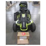 Ryobi 38 in. Battery Electric Riding Lawn Mower, With Charger, .47 Hours - Tire on RH Rear is Split - needs replacing - Otherwise Perfect!