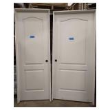 2 DOORS 36 in. x 80 in. AND 28IN X80  2-Panel Arch Top Solid Core Textured Primed Composite Single Prehung Interior Door