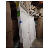 2 DOORS 36 in. x 80 in. AND 28IN X80  2-Panel Arch Top Solid Core Textured Primed Composite Single Prehung Interior Door