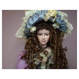 Lovely China Doll in Fancy Dress on a Stand