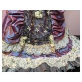Lovely China Doll in Fancy Dress on a Stand