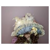 Lovely China Doll in Fancy Dress on a Stand