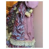 Lovely China Doll in Fancy Dress on a Stand