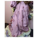 Lovely China Doll in Fancy Dress on a Stand