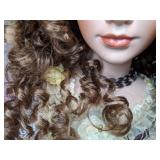 Lovely China Doll in Fancy Dress on a Stand