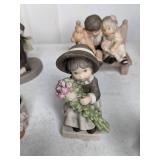Collection of 7 Enesco NBM Bahner Studios Figurines