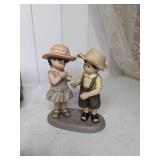 Collection of 7 Enesco NBM Bahner Studios Figurines