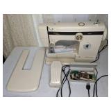 Singer Sewing Machine, Case, and Accessories