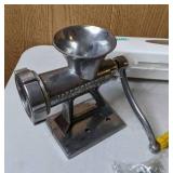 Kitchen Items: Meat Grinder, Potato Ricer, and Saran Wrap Holder