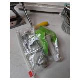 Kitchen Items: Meat Grinder, Potato Ricer, and Saran Wrap Holder