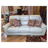 Cream Colored Adjustable Reclining Sofa with USB Chargers & Floor Pillows