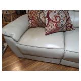 Cream Colored Adjustable Reclining Sofa with USB Chargers & Floor Pillows