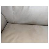 Cream Colored Adjustable Reclining Sofa with USB Chargers & Floor Pillows