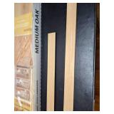 Lot of Six Medium Oak EZ Planks and Two Pieces of Moulding