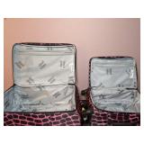 Lot of Two Pink and Black, Animal Print, Rolling Suitcases