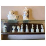 Collection of Precious Moments Figurines and More on Shelves