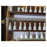 Collection of Precious Moments Figurines and More on Shelves