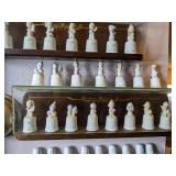 Collection of Precious Moments Figurines and More on Shelves