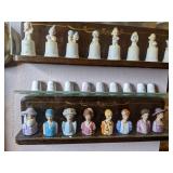Collection of Precious Moments Figurines and More on Shelves