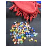 VINTAGE RED LEATHER MARBLE BAG FULL OF MARBLES