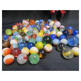 VINTAGE RED LEATHER MARBLE BAG FULL OF MARBLES