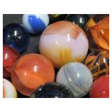VINTAGE RED LEATHER MARBLE BAG FULL OF MARBLES