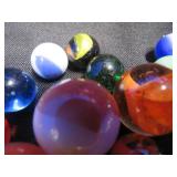 VINTAGE RED LEATHER MARBLE BAG FULL OF MARBLES