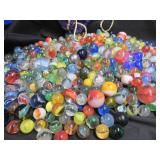 CROWN BAG FULL OF VINTAGE MARBLES.