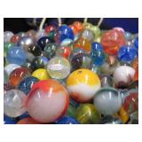 CROWN BAG FULL OF VINTAGE MARBLES.