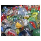 CROWN BAG FULL OF VINTAGE MARBLES.