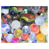 CROWN BAG FULL OF VINTAGE MARBLES.