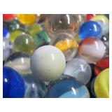 CROWN BAG FULL OF VINTAGE MARBLES.