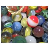 CROWN BAG FULL OF VINTAGE MARBLES.