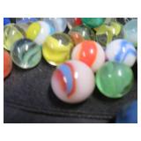 CROWN BAG FULL OF VINTAGE MARBLES.