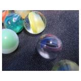 CROWN BAG FULL OF VINTAGE MARBLES.