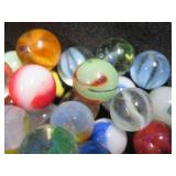 CROWN BAG FULL OF VINTAGE MARBLES.