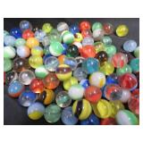 FRINGED LEATHER POUCH OF VINTAGE MARBLES