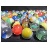 FRINGED LEATHER POUCH OF VINTAGE MARBLES