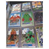 LARGE BOOK FILLED WITH YU-GI-OH / MISC. COLLECTABLE CARDS.